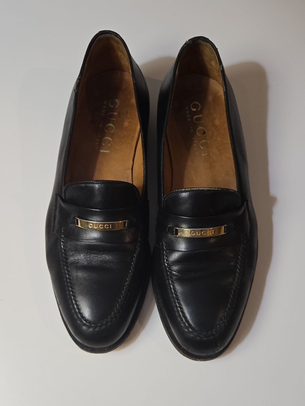 Vintage 90s Gucci Black Leather Women's Loafers with Gold Logo Bar